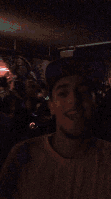 a blurry photo of a crowd at a party