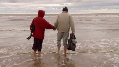 Hayley And Roy Walking In The Sea Coronation Street GIF - Hayley And Roy Walking In The Sea Coronation Street Hayley GIFs