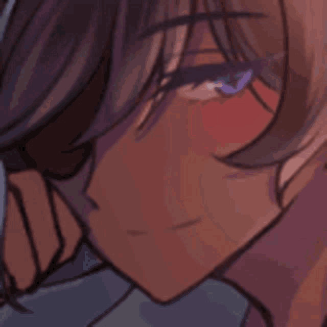 a close up of a person 's face with a purple eye and red cheek .