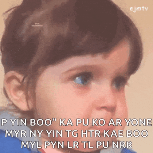 a little girl is making a funny face with a caption that starts with the letters ejmtv