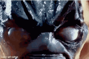 a close up of a person 's face with the words super-girl-tainen on the bottom