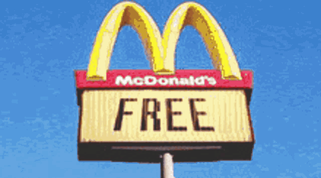 a mcdonald 's sign that says " free " on it
