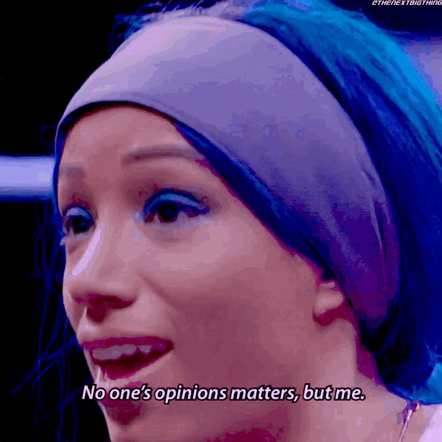 a woman with blue hair and a headband says no one 's opinions matters but me