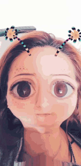 a woman wearing a flower headband looks like a cartoon character with big eyes