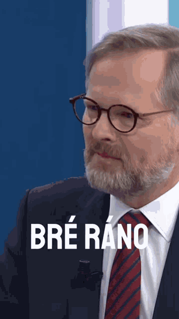 a man with glasses and a beard has the name bre rano on the bottom