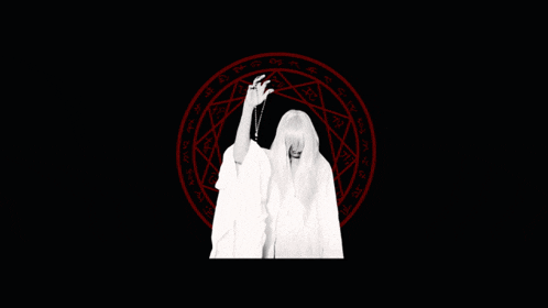 a woman in a white robe is standing in front of a red circle with chinese writing