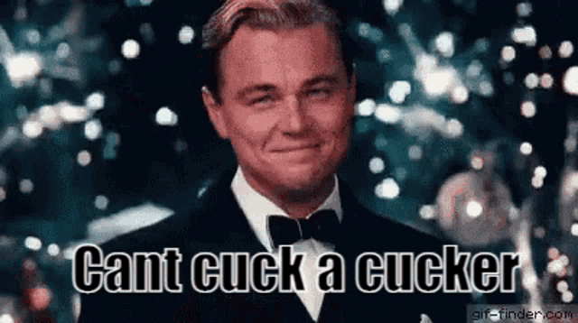 a man in a tuxedo is smiling and says cant cuck a cucker