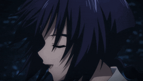 a close up of a girl 's face with purple hair