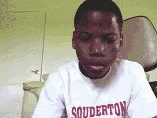 a man wearing a shirt that says souderton