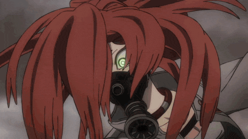 a woman with red hair wearing a gas mask with green eyes