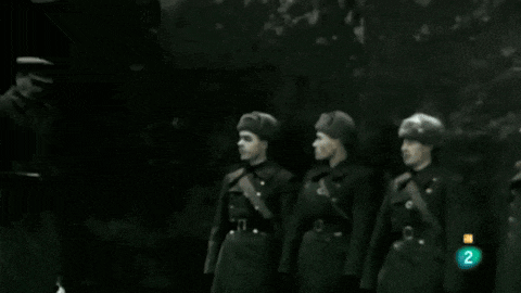 a group of soldiers are standing in a line with the number 2 on the bottom right