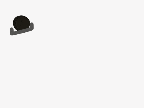 a person is sitting on a chair with a black hat on their head .