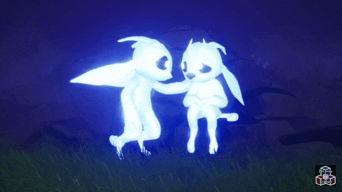 two glowing animals are standing next to each other in a video game