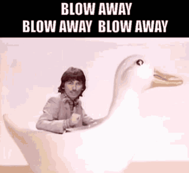 a man is sitting on a white duck with the words blow away blow away blow away below him