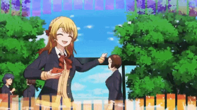 a girl in a school uniform is holding a red heart in her hand .
