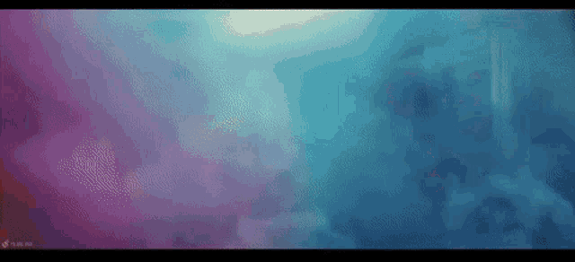 a blue and purple background with a lot of smoke coming out of it .