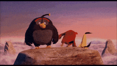 three angry birds are standing on a rock in the clouds