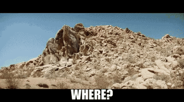 a large rocky hillside with the words where below it