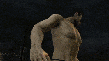 a man without a shirt is standing in front of a city at night with a circle with the letter b on it
