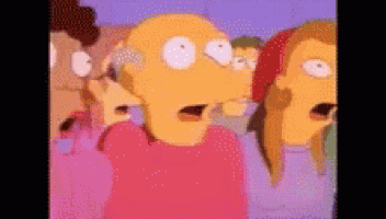 a group of cartoon characters are looking at something with their mouths open .
