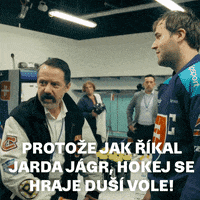 two men are talking in a locker room with the words protoze jak rikal jarda jagr