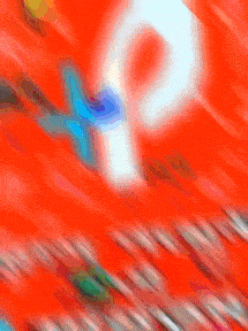 a blurred image of a red background with the letter p