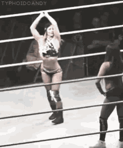 two women in a wrestling ring with typhoidcandy written on the bottom