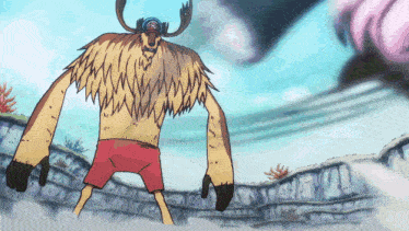 tony tony chopper from one piece is standing in front of a rock wall