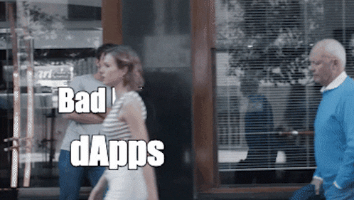 a woman walking down the street with the words bad dapps written on her