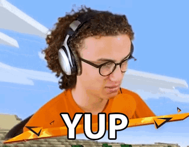 a young man wearing headphones and glasses with the word yup behind him