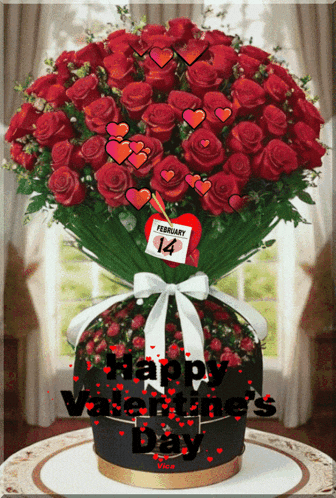 a bouquet of red roses in a vase with a card that says february 14