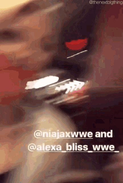 a blurry photo of a person with the words alexa bliss wwe written on the bottom