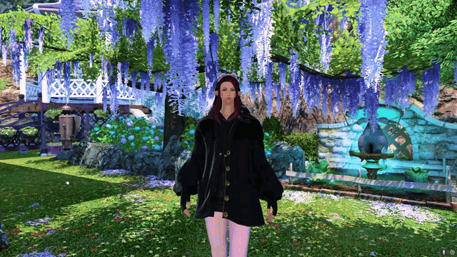 a woman in a black coat stands in a garden with purple flowers hanging from trees
