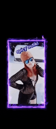 a picture of a woman in the snow with the words spicy butiki