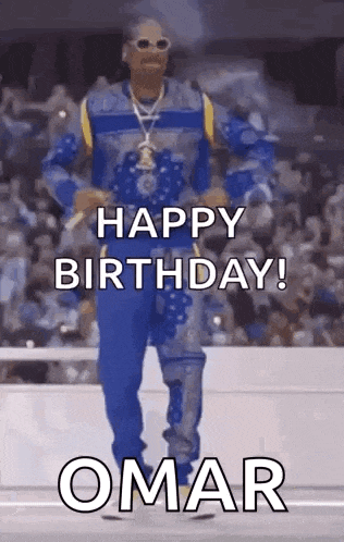 snoop dogg is dancing in front of a crowd and saying `` happy birthday ! ''