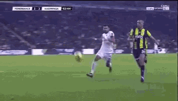 a soccer game between fenerbahce and kasimpasa is being played