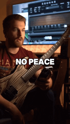 a man playing a guitar with the words " no peace " written above him