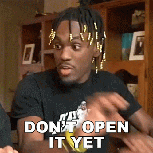 Dont Open It Yet Adrian Harding GIF - Dont Open It Yet Adrian Harding Daydrian Harding GIFs
