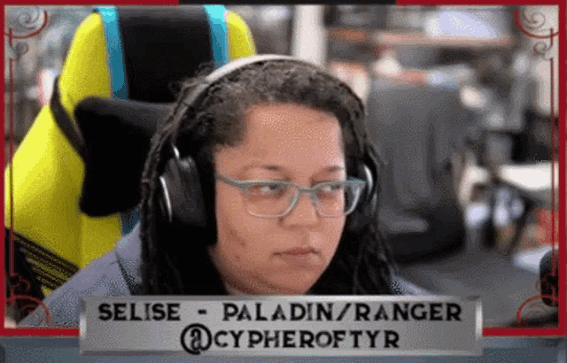 a woman wearing headphones has a sign that says selise paladin ranger