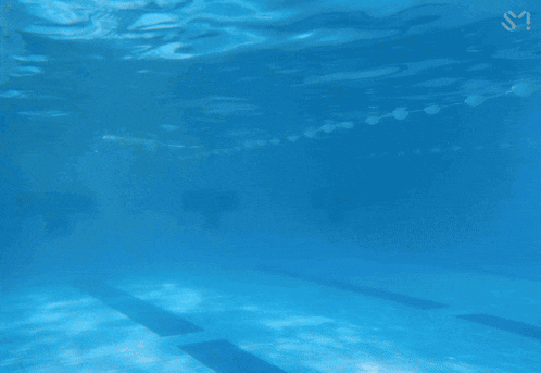 the sun shines through the water and shines on the surface
