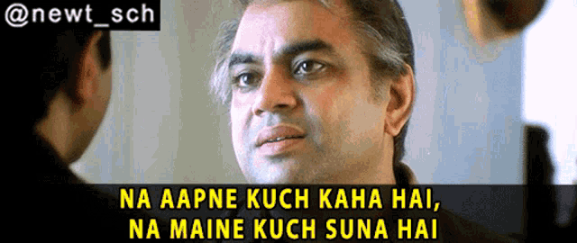 a man looking at another man with the caption na aapne kuch kaha hai