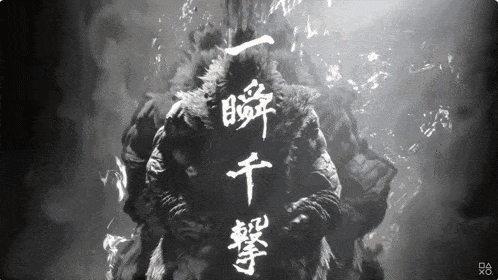 a black and white image of a monkey with chinese writing