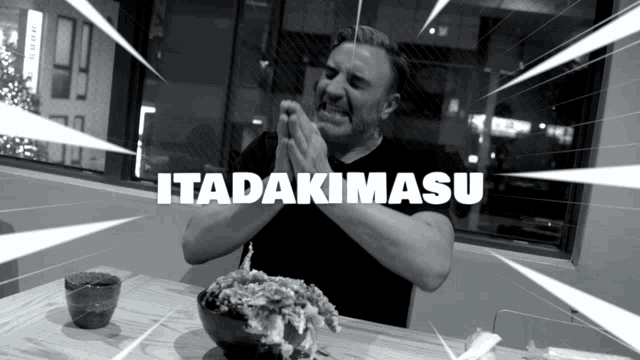 a man sitting at a table with a bowl of food and the word itadakimasu on the bottom right