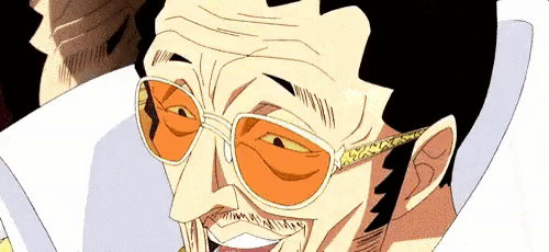 a close up of a man wearing sunglasses and a white shirt
