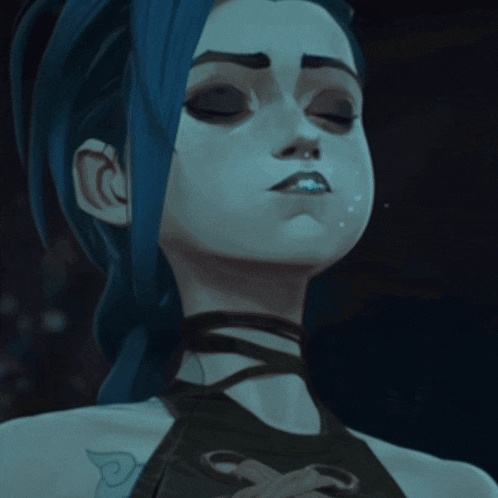 a close up of a woman 's face with a tattoo on her chest that says p