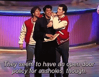 a group of men standing next to each other with the words they seem to have an open door policy for assholes though