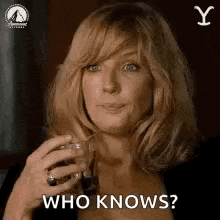 a woman is holding a glass of wine and saying `` who knows ? ''