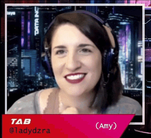 a woman wearing headphones is smiling and has the name amy on the bottom right