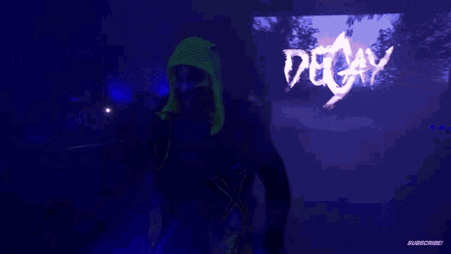 a person in a neon green outfit stands in front of a decay sign