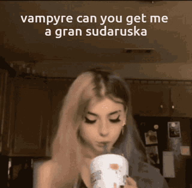 a woman drinking from a cup with a caption that says vampire can you get me a gran sudaruska
